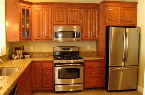 stainless steel appliances and oak cabinets|updating honey oak cabinets.